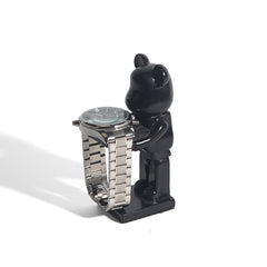 Astronaut resin stand with Apple Watch displayed