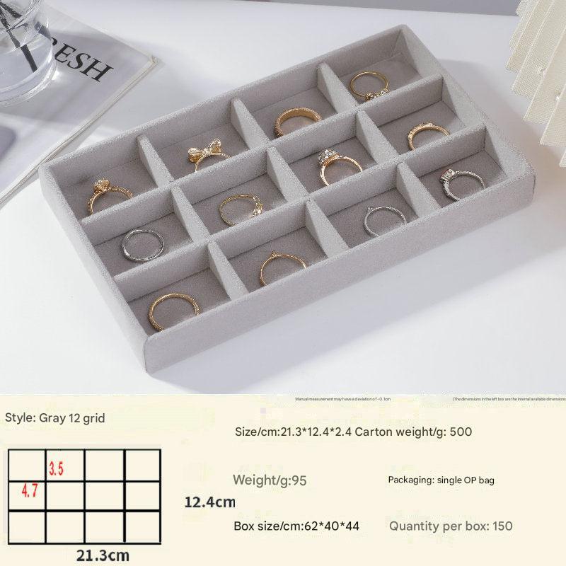 Beige velvet-lined jewelry storage for bracelets