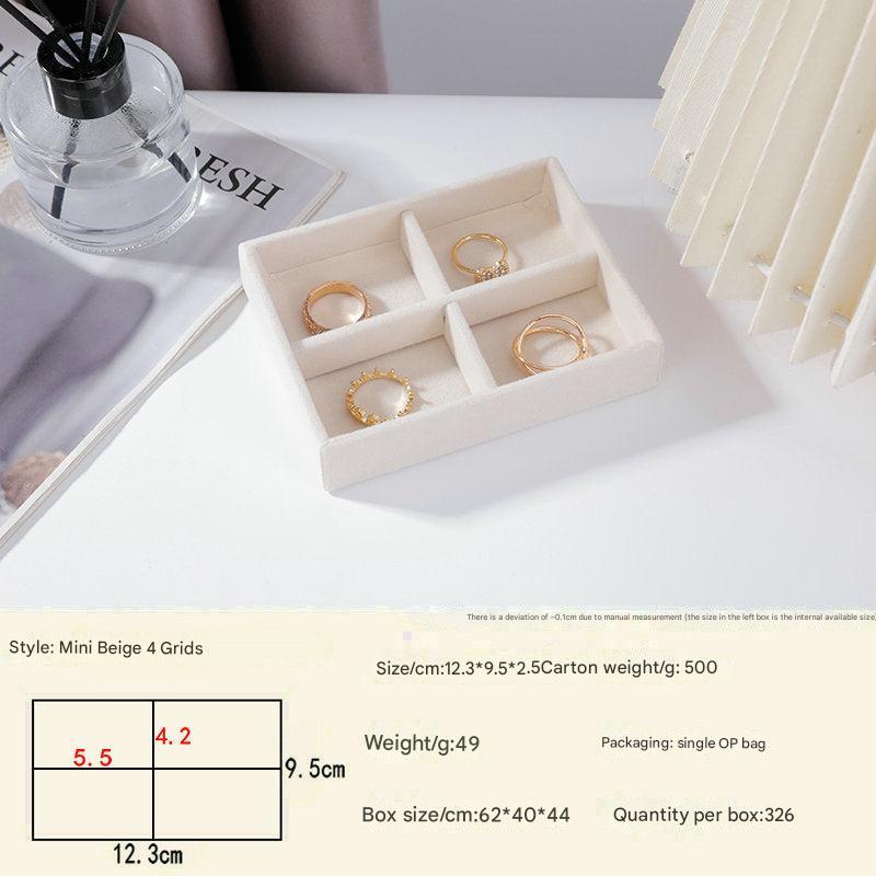 Beige velvet-lined jewelry storage for bracelets