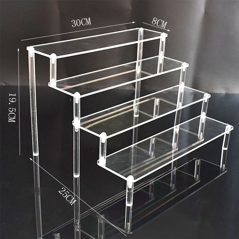 Transparent acrylic display stand showing organised items