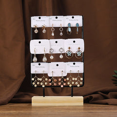 Side View of Wooden and Iron Earring Display