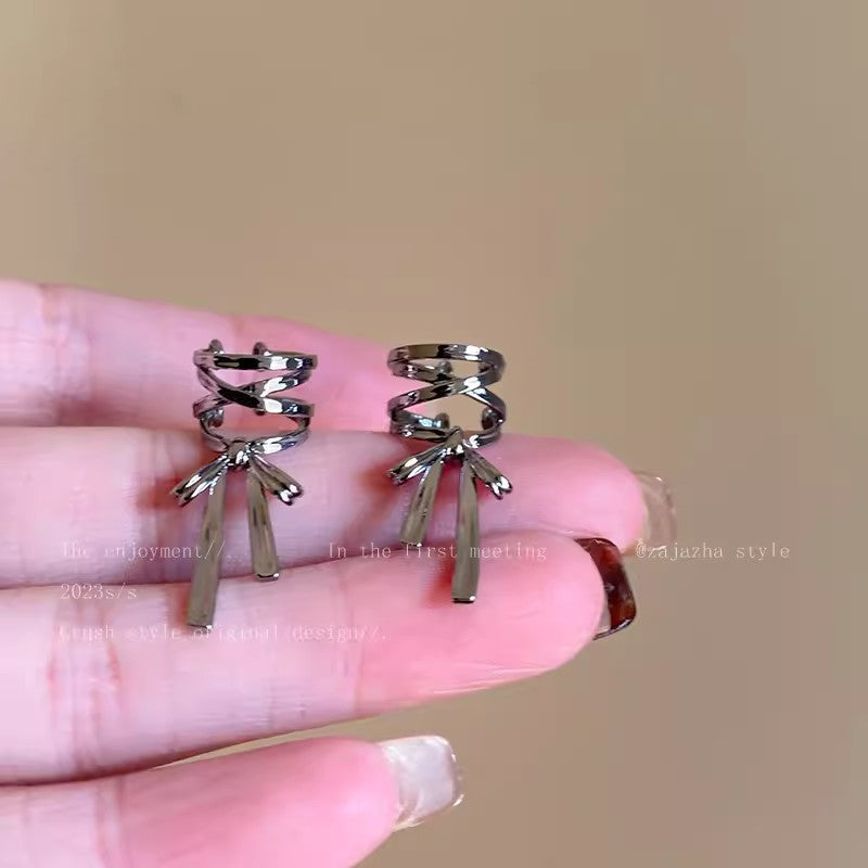 Stylish ribbon ear cuff enhancing casual outfit