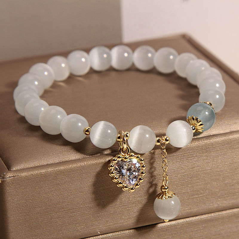 Variety of stylish cat eye stone bracelets displayed