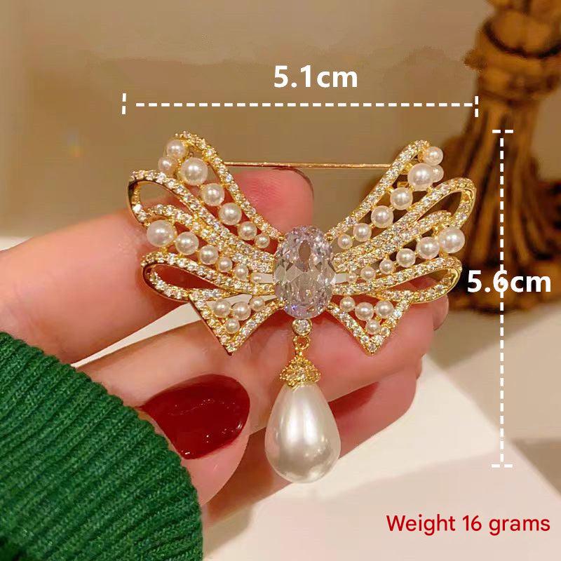 Lightweight pearl brooch showcased on fabric