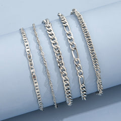 Elegant metal anklet worn on a woman's ankle