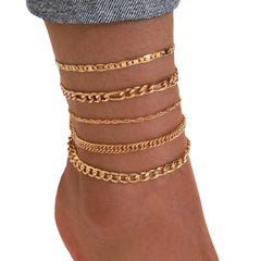 Stylish vintage anklet set displayed on a stand