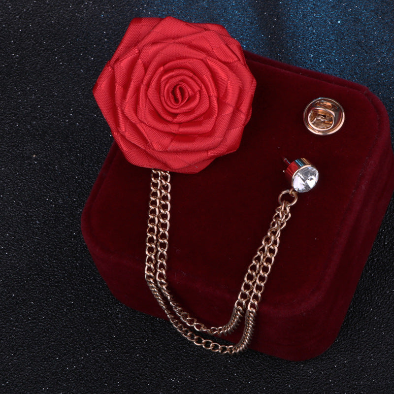 Close-up of camellia brooch with rhinestones