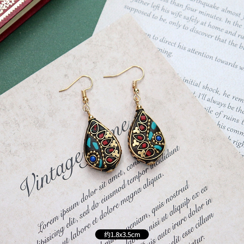 Artistic vintage earrings in mixed materials
