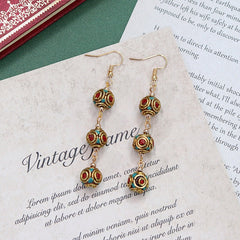 Artistic vintage earrings in mixed materials