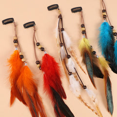 Vibrant bohemian hair clip with tassels close-up