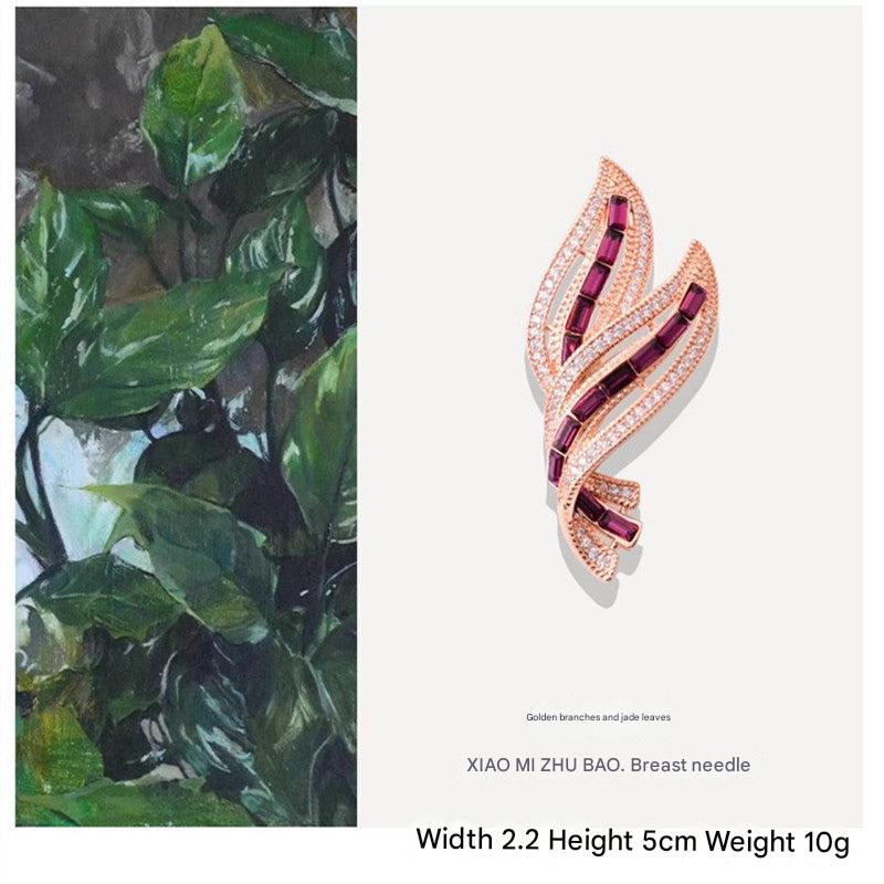 multiple views of leaf pin brooch