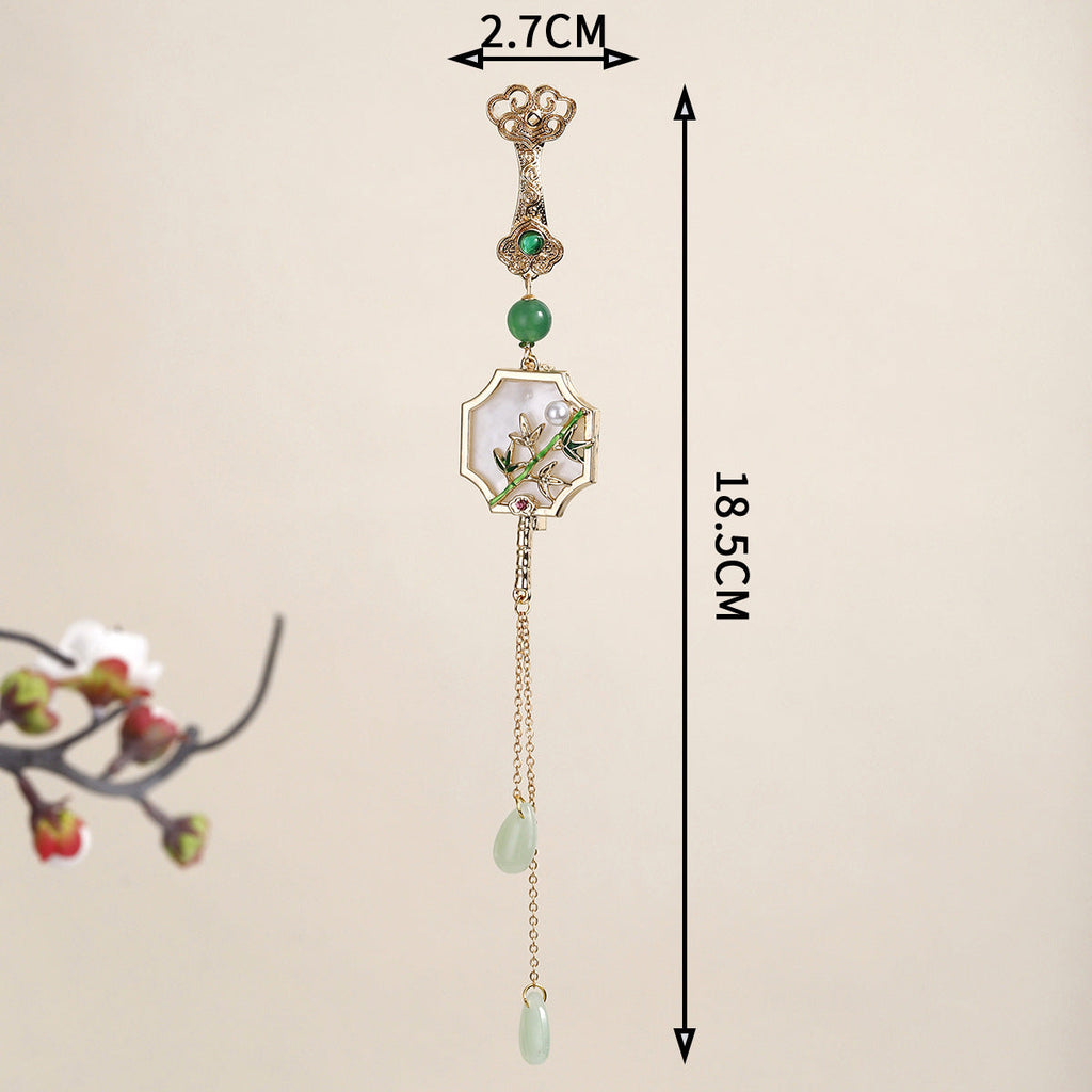 pearl accented vintage brooch display