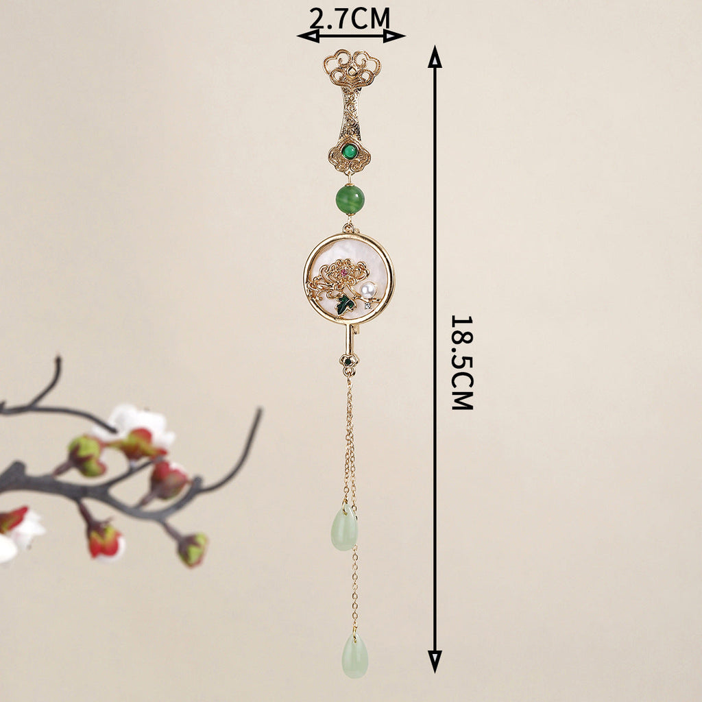fashion brooch worn with dress outfit