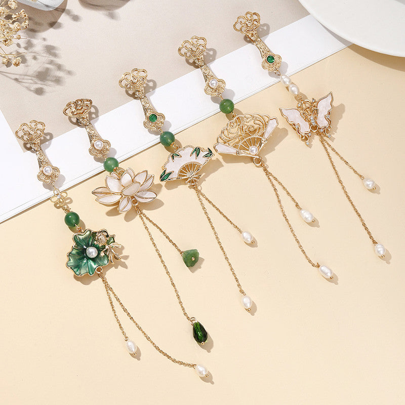 pearl accented vintage brooch display