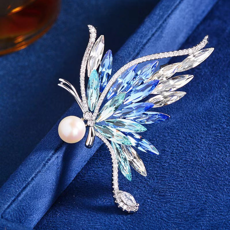 Stylish women wearing butterfly brooch accessory