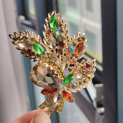 Purple floral brooch on display