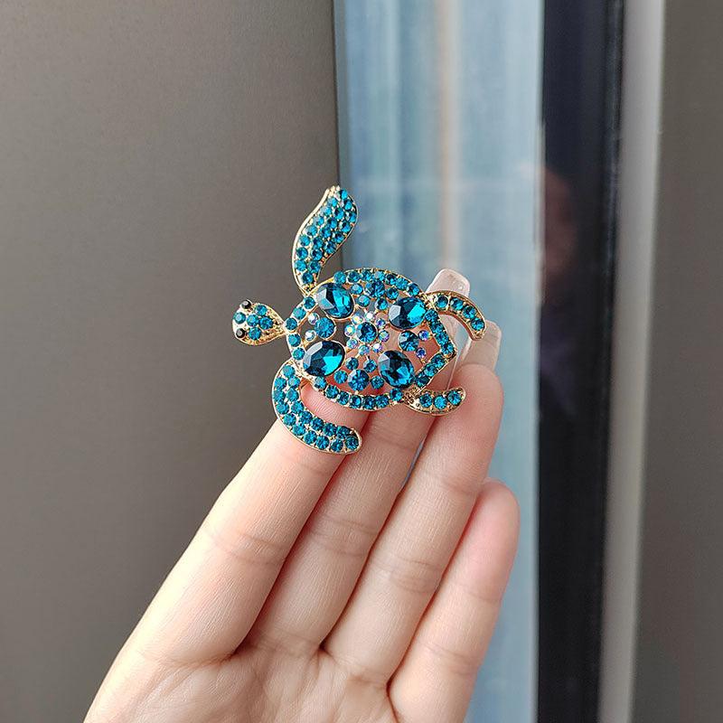Charming Rhinestone Turtle Brooch on display image 3