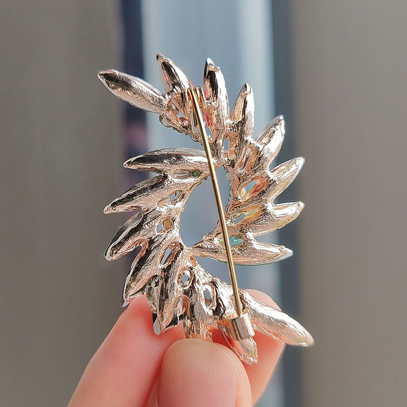 Elegant floral design brooch on fabric