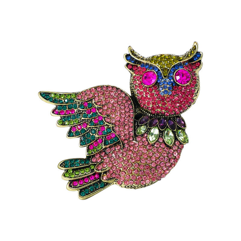 owl brooch on a jewellery display