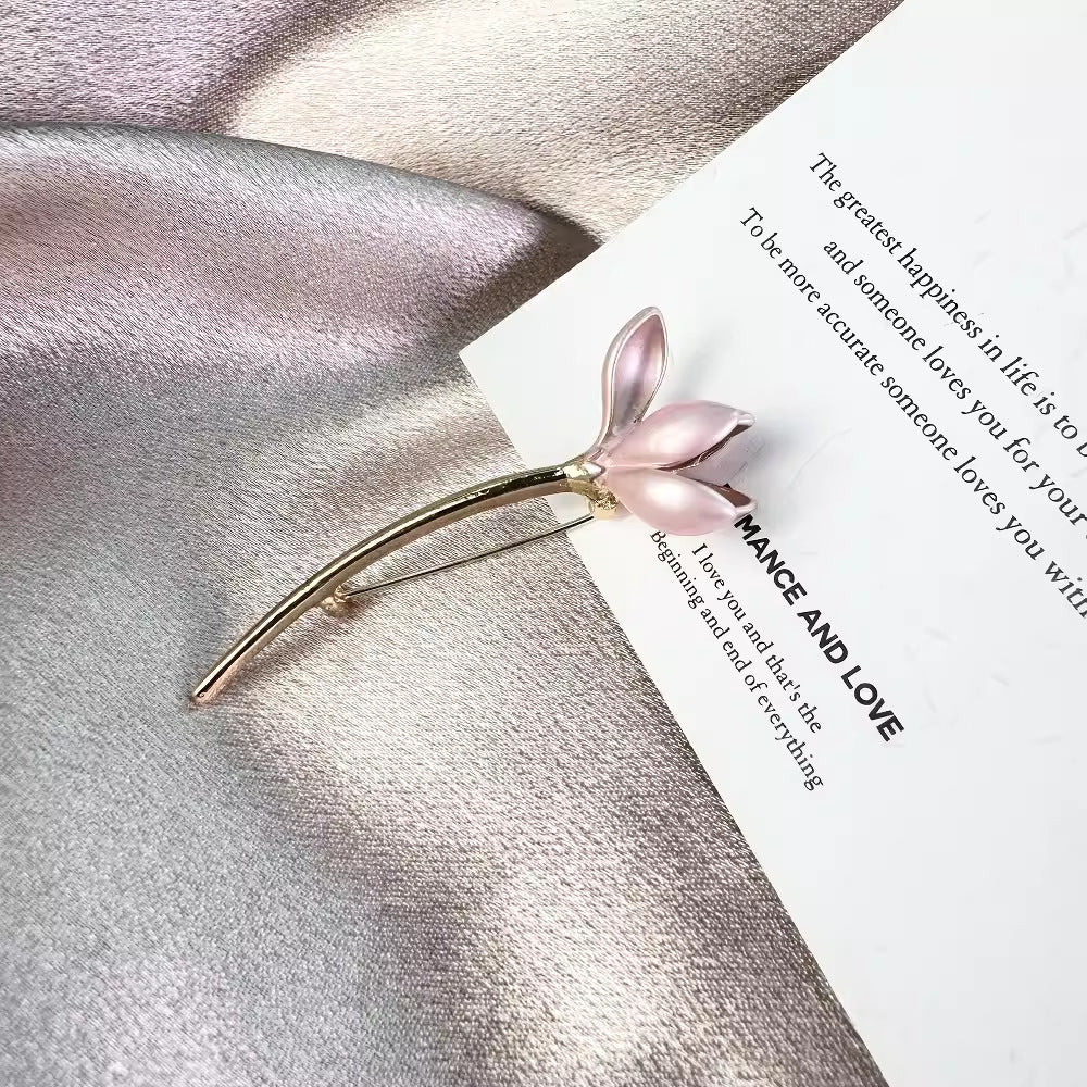 Floral brooch against a neutral background