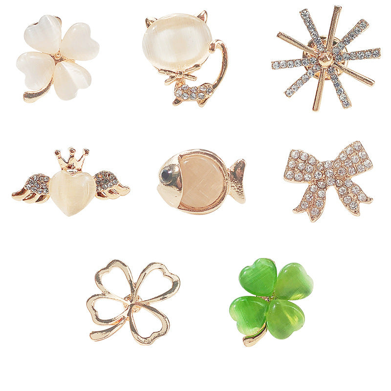 Lightweight brooch pin displayed on fabric