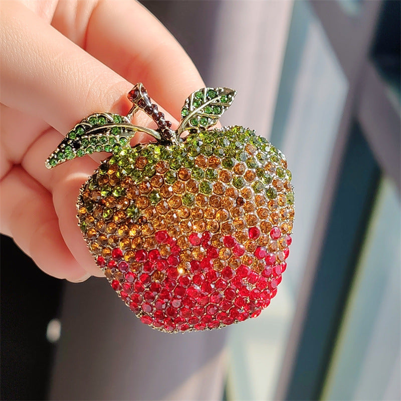 Unique vintage fruit brooch showcasing craftsmanship
