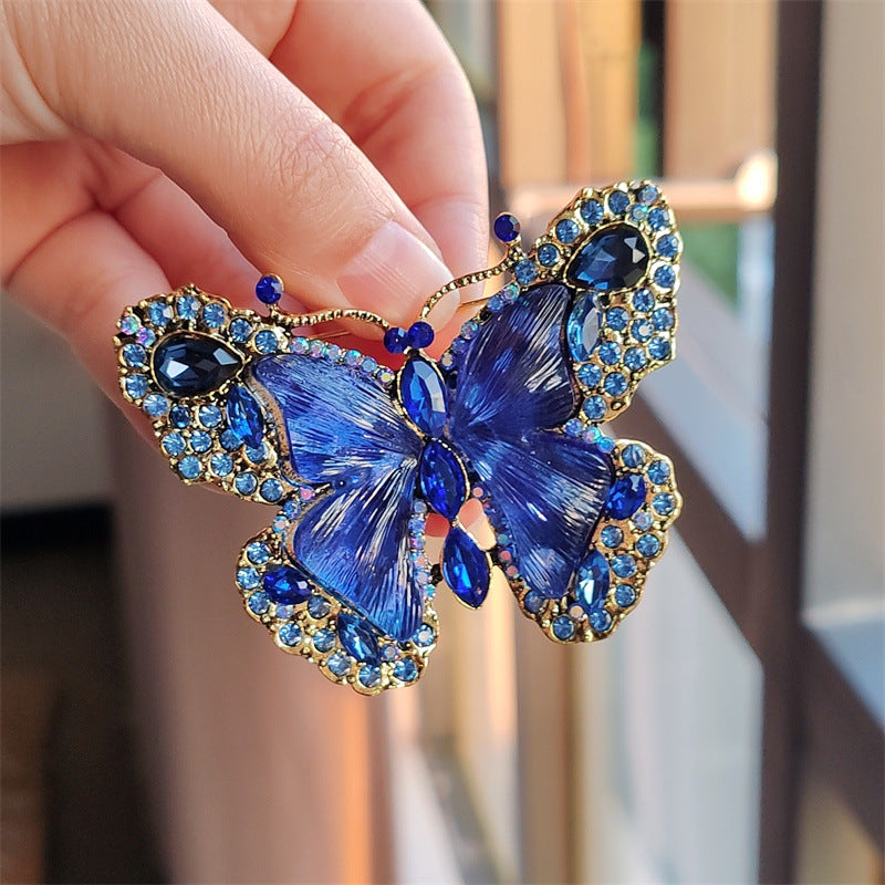 Elegant butterfly brooch on a scarf