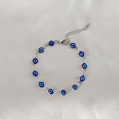 Turquoise Blue Evil Eye Bracelet on Table