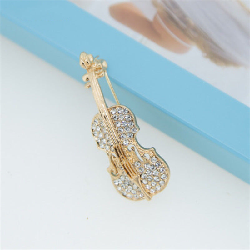 Back Display of Elegant Violin Brooch