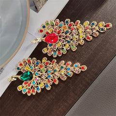 Alloy peacock brooch on display