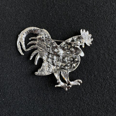 Detailed look at intricate design of brooch