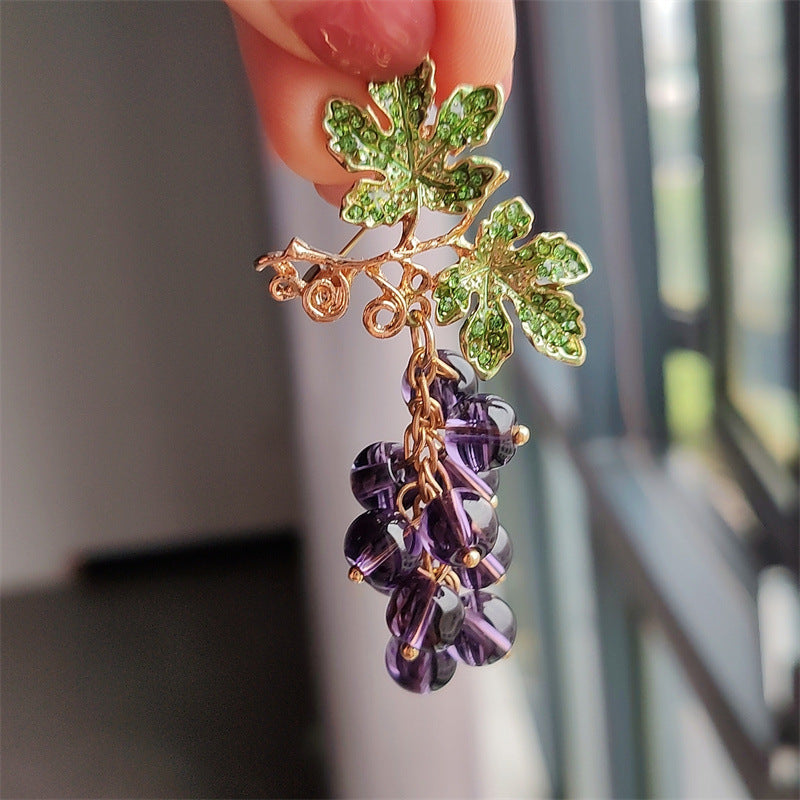 Charming brooch showcasing grapes and cherries