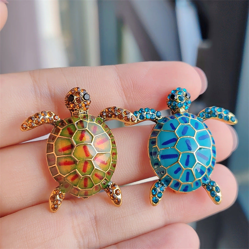 Textured turtle pin with sparkling rhinestones