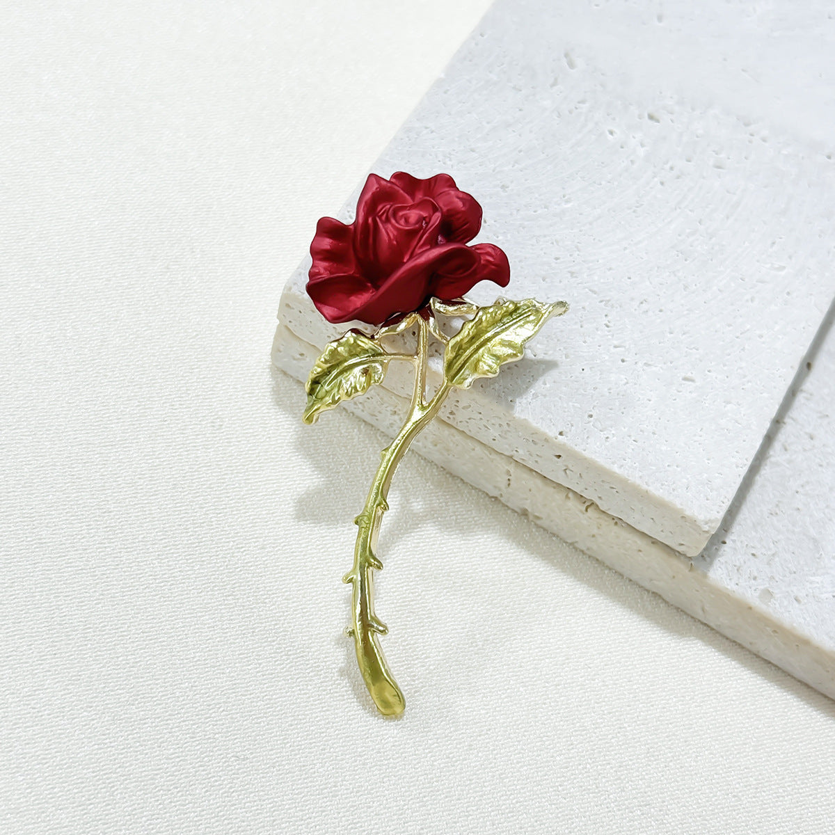 Elegant Red Rose Brooch on fashion jacket