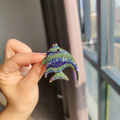 close-up of cute colourful fish brooch