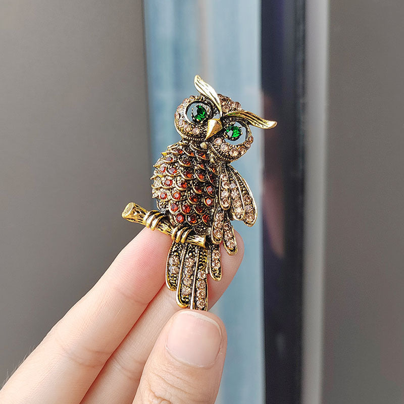 Luxury Diamond-Studded Blue Owl Brooch Pin displayed with elegance