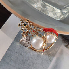 Charming snowman brooch on display