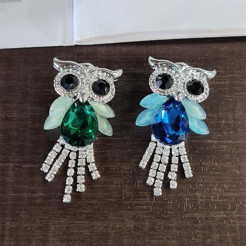 Stylish owl lapel pin on a jacket