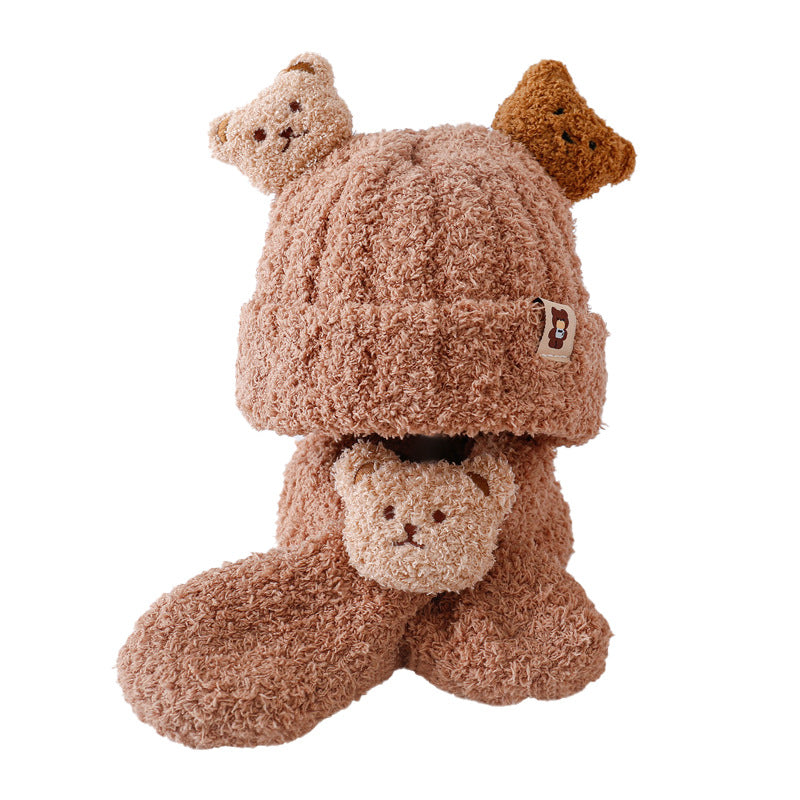 Baby wearing bear hat during winter outdoor play