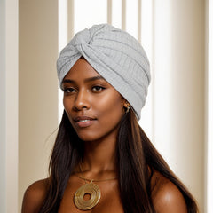 model wearing a fashionable twist headwrap beanie