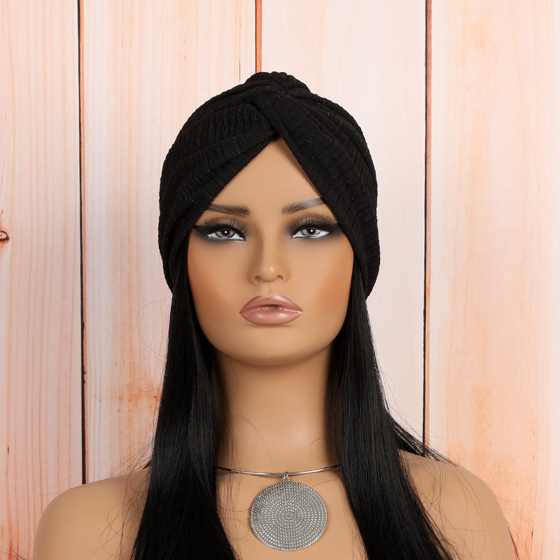 white elastic twist headwrap beanie styled on a model