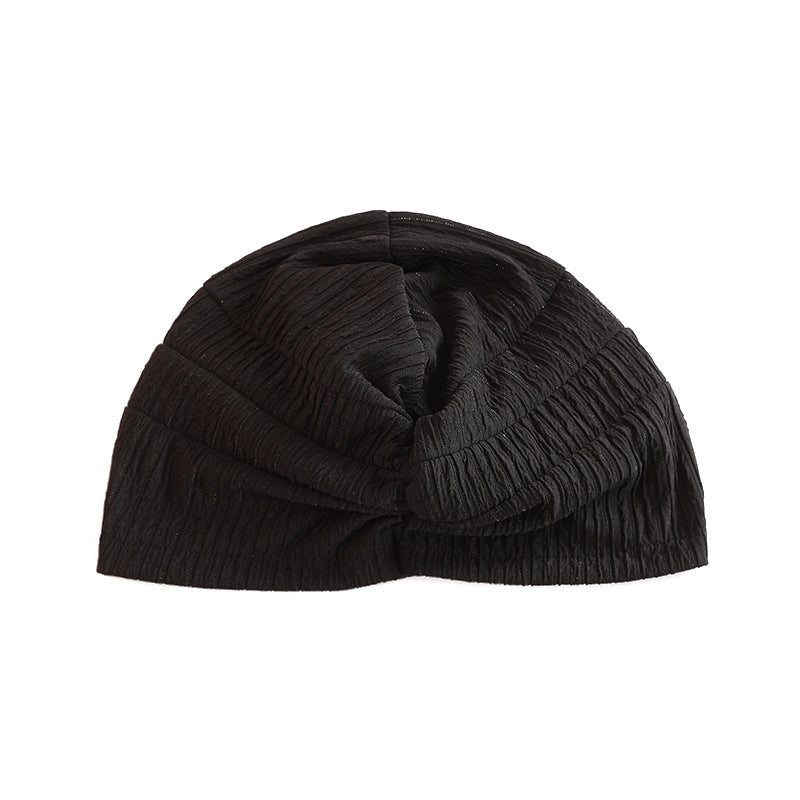 navy blue stylish beanie worn outdoors