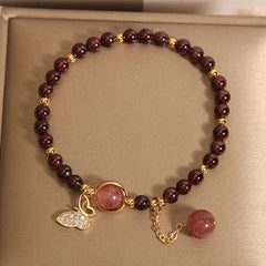 Stylish garnet bracelet worn on wrist