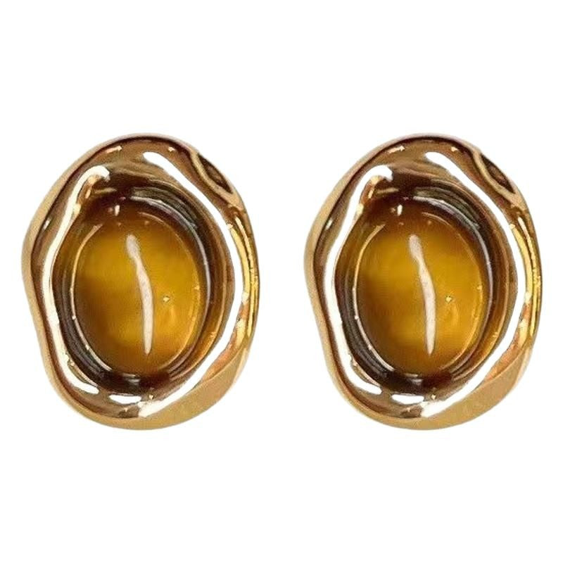 Stylish lightweight earrings in gold finish