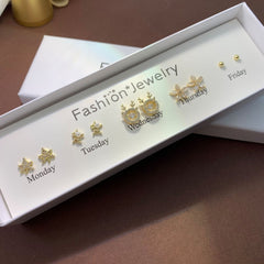 Playful heart cat ear studs elegantly displayed