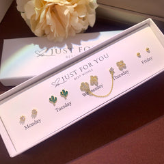 Charming earrings set with floral design
