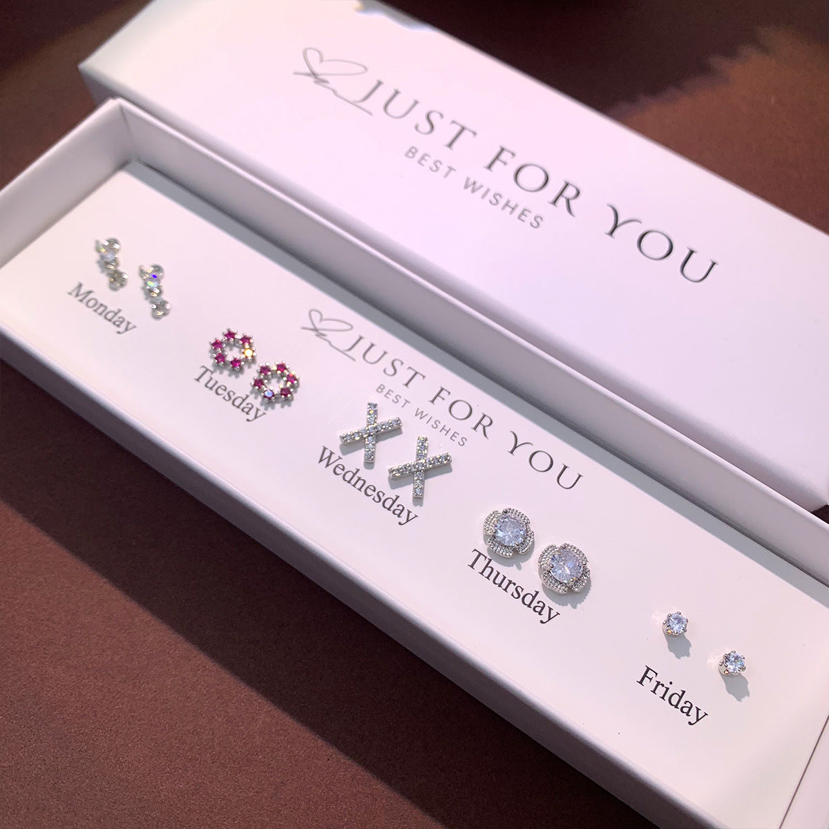 Elegant S925 Silver Heart Cat Ear Earrings on model