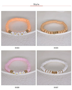 Close-up of colourful geometric charm bracelet