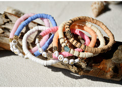Fashionable clay bracelet on a white background
