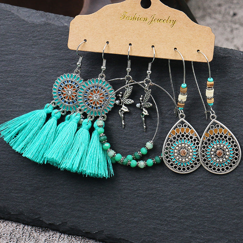 Close-up of waterdrop earrings in vibrant colours image 2